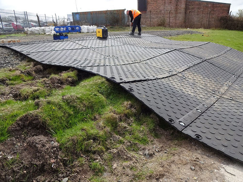 Rubber Ground Protection Mats vs. HDPE: A Head-to-Head Performance Analysis